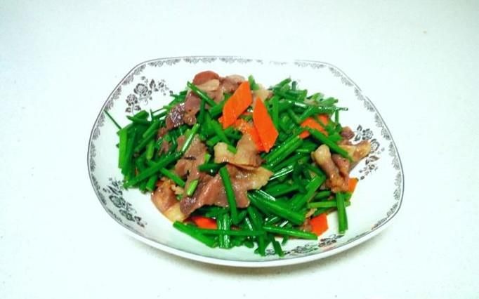 韭菜苔炒羊肉卷的做法