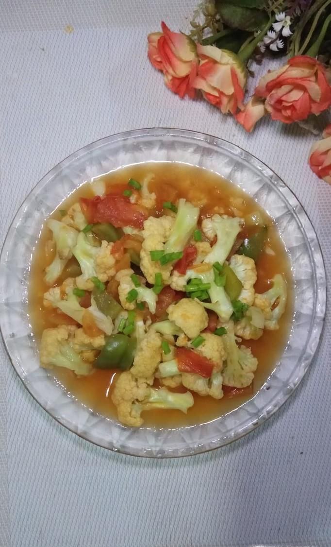 怎样做美味的花菜炒西红柿？