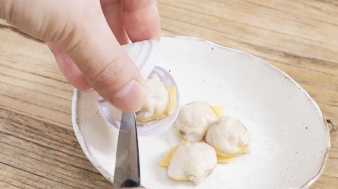 怎么做丝瓜蛤蜊肉丸汤?