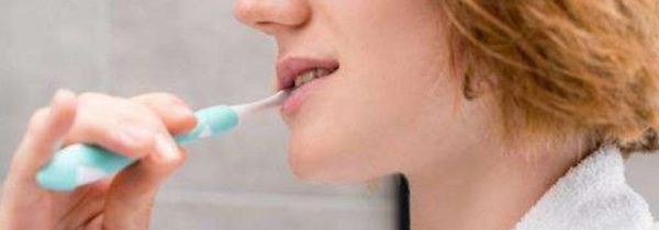 电动牙刷横着刷还是竖着刷