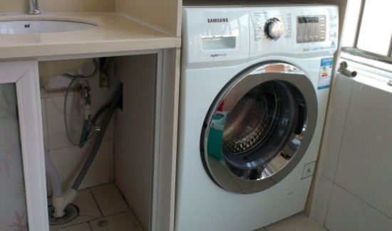 洗衣机运转时上面能放东西不能