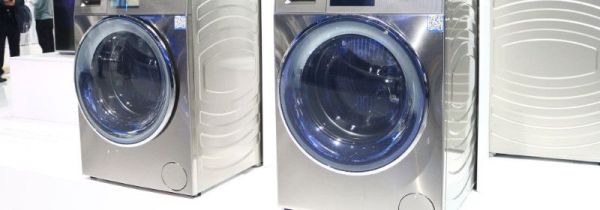 洗衣机运转时上面能放东西不能