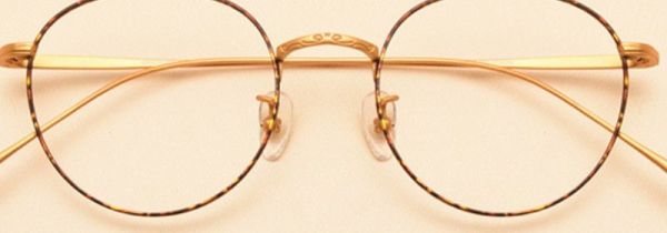 眼镜片掉了怎么按回去