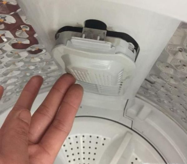 洗衣机过滤网如何拆卸 上海小天鹅洗衣机维修