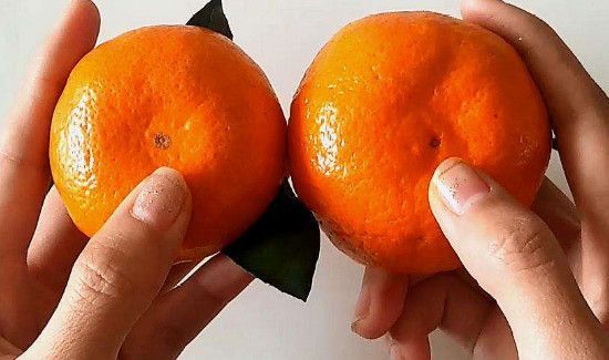 为什么剥橘子手变红