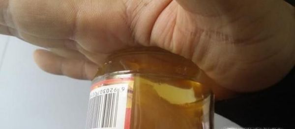 如何不用刀开罐头