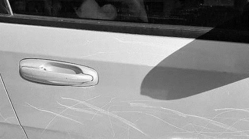 汽车被刮划了怎么办