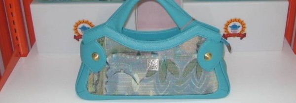 皮包提手发粘怎样处理