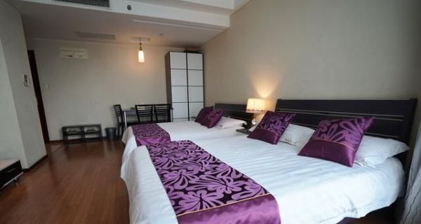 酒店床尾经常会放一块长条的布，这是用来干嘛的？