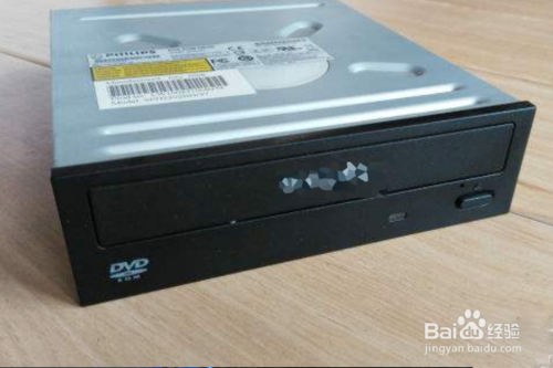 电脑如何放光盘？