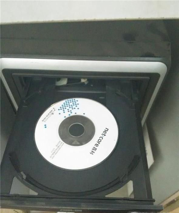 怎么把光盘放入电脑中播放